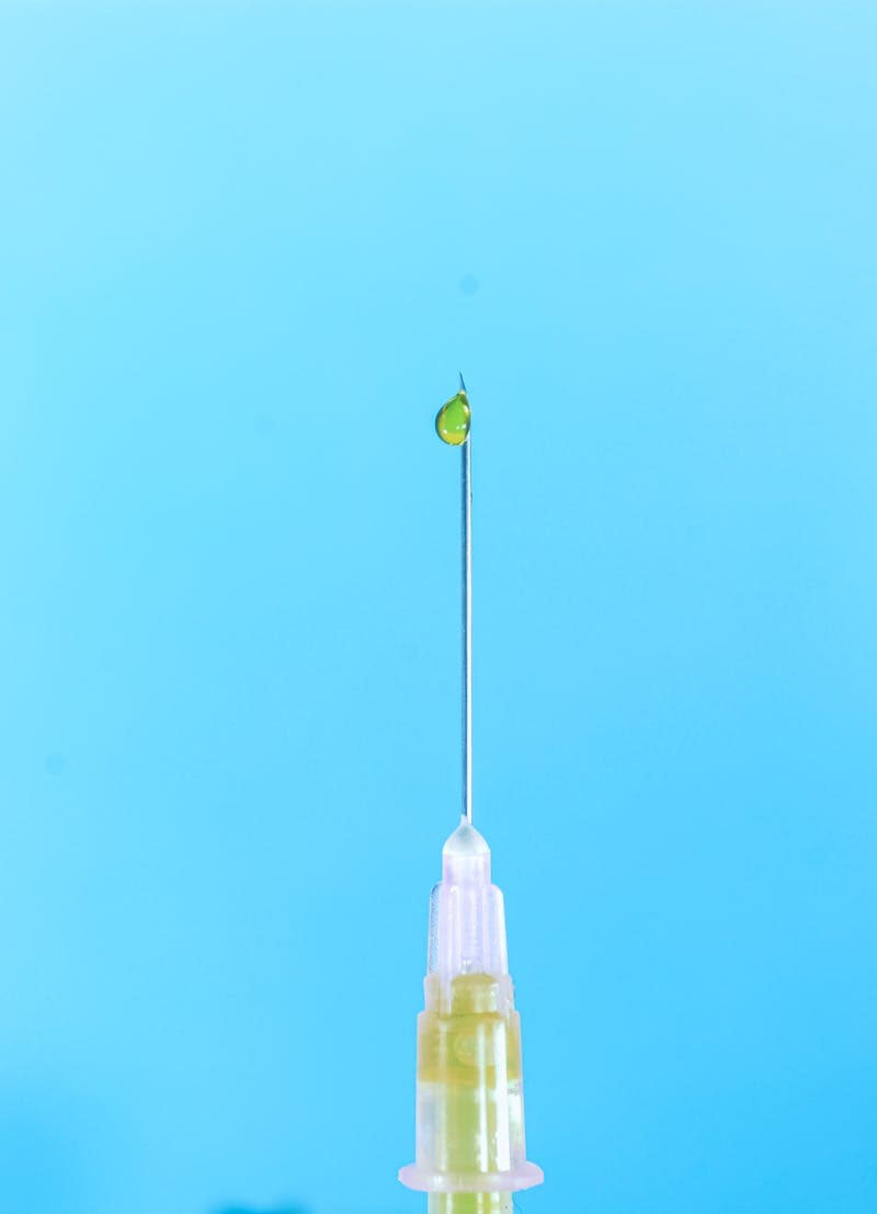Close-up of syringe needle — hyaluronidase lip filler dissolving procedure guide